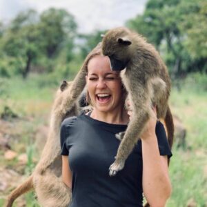volunteer with baboons