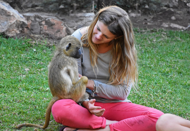 Volunteer with baboon