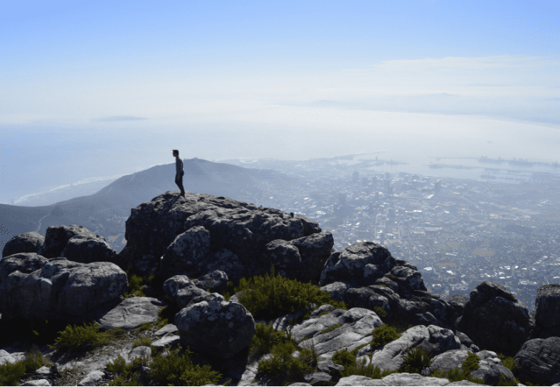 Volunteer on top of table mountain in South Africa