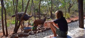Girl with animals at sanctuary in Africa