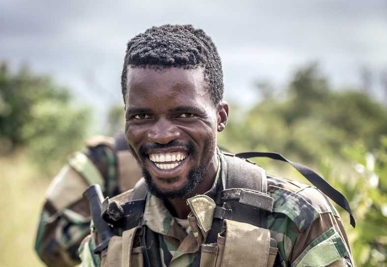 anti-poaching ranger up close smiling