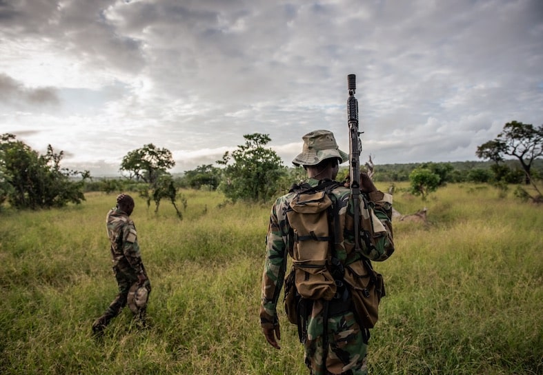 two anti-poaching rangers on patrol