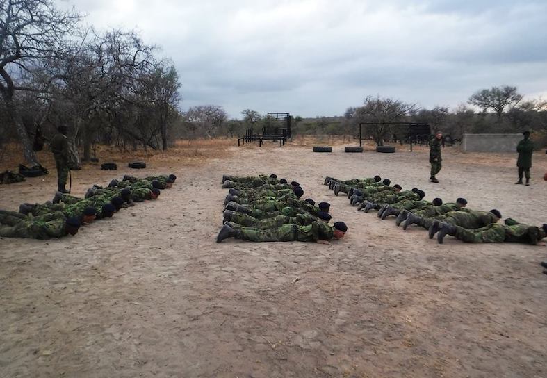 anti-poaching students doing drills on the ground