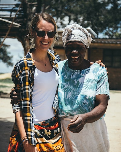 Volunteer with community member in village