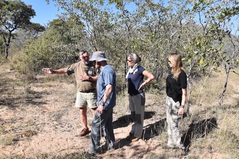 Anti-poaching volunteers learning tracks